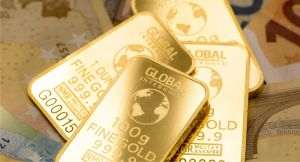 Investitorii s-au refugiat în aur şi dolar